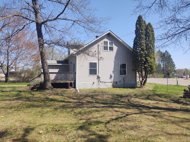 36998 Quest Rd, Hillman, MN 56338 - view of home's exterior with a deck and a yard
