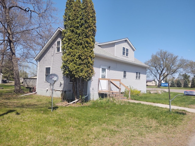36998 Quest Rd, Hillman, MN 56338 - view of side of property featuring a yard