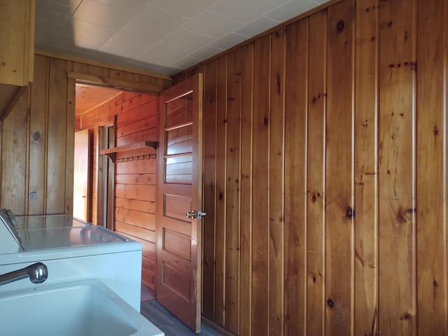 36998 Quest Rd, Hillman, MN 56338 - clothes washing area featuring wood walls and washer / clothes dryer