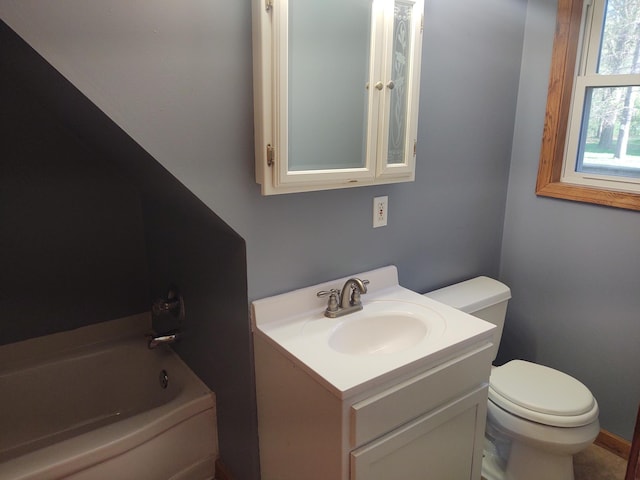 36998 Quest Rd, Hillman, MN 56338 - bathroom featuring toilet, vanity, and a bath