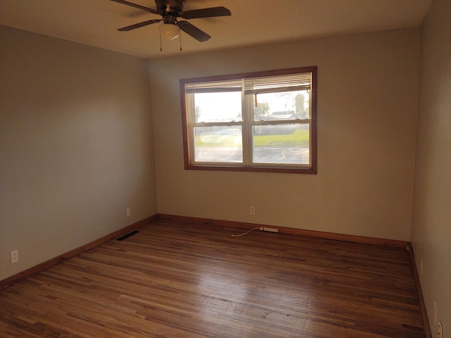 36998 Quest Rd, Hillman, MN 56338 - unfurnished room featuring ceiling fan, wood finished floors, and baseboards