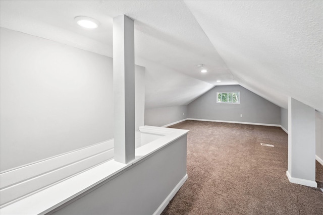 3410 Russell Ave N, Minneapolis, MN 55412 - bonus room featuring carpet floors, vaulted ceiling, and baseboards