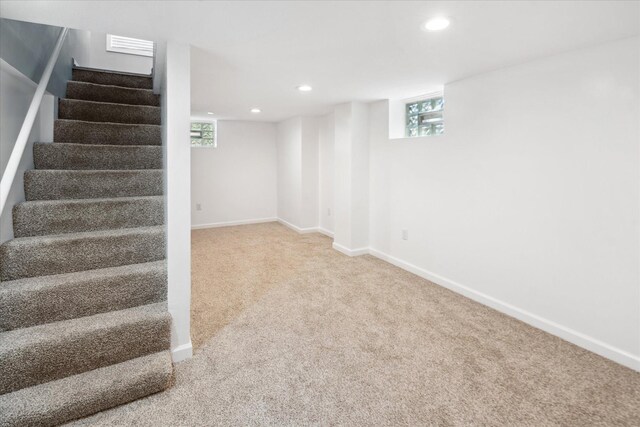 3410 Russell Ave N, Minneapolis, MN 55412 - below grade area with stairway, carpet floors, recessed lighting, and baseboards