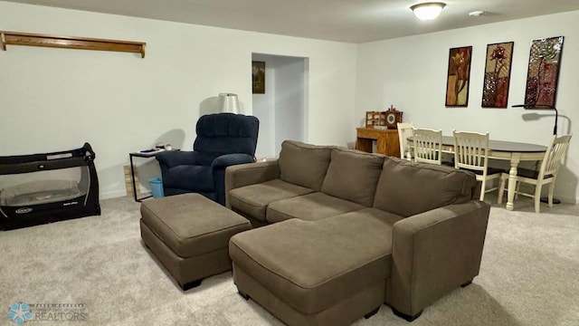 5477 11th St W, West Fargo, ND 58078 - living room featuring light colored carpet and baseboards