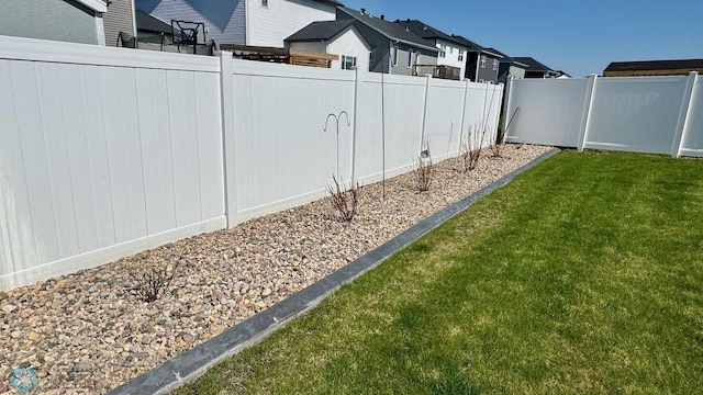 5477 11th St W, West Fargo, ND 58078 - view of yard with a residential view and fence