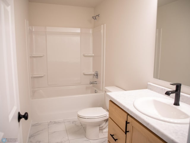 full bath with shower / bathing tub combination, vanity, toilet, and marble finish floor