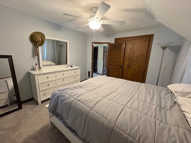 1105 13th St N, Benson, MN 56215 - carpeted bedroom featuring a ceiling fan, a textured ceiling, and baseboards