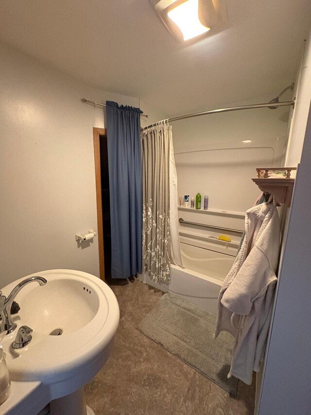 1105 13th St N, Benson, MN 56215 - full bathroom with a sink and shower / bath combination with curtain