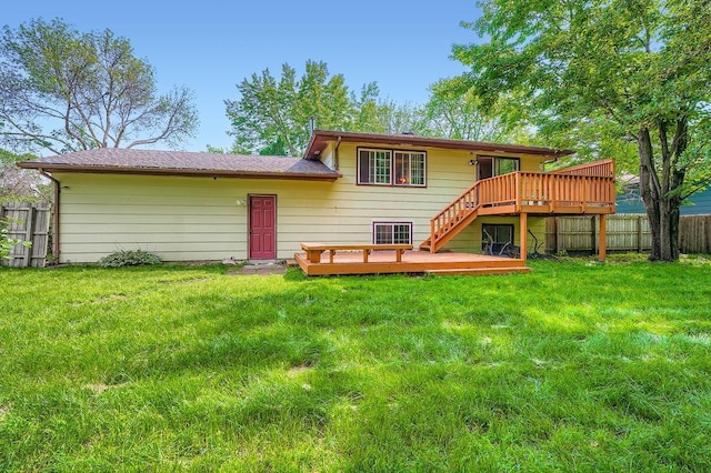 2108 Gunflint Trl, Brooklyn Park, MN 55444 - rear view of property with a wooden deck and stairway