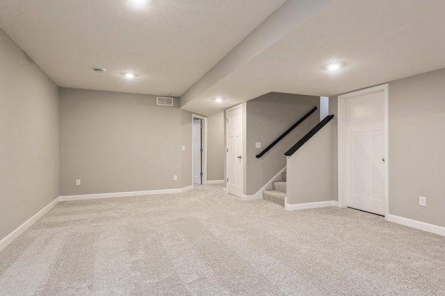 4424 Obsidian Way, Victoria, MN 55386 - finished basement with light colored carpet, stairs, baseboards, and recessed lighting