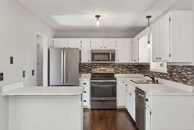 1604 Viking Dr, Buffalo, MN 55313 - kitchen with appliances with stainless steel finishes, a sink, light countertops, and backsplash