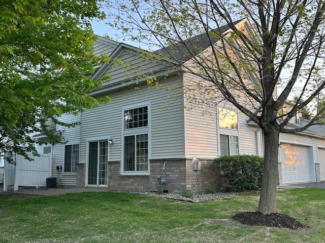 view of home's exterior featuring a yard