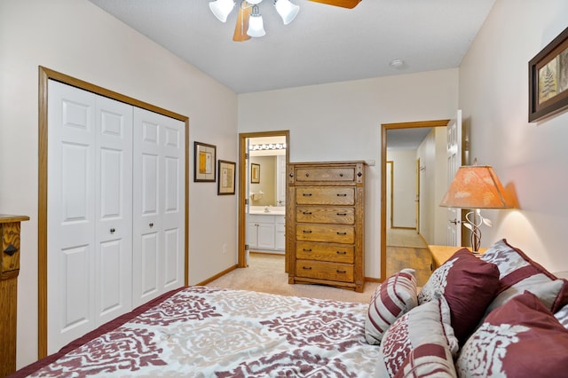 7625 Lachman Ave NE, Otsego, MN 55301 - bedroom featuring light carpet, a closet, and a ceiling fan