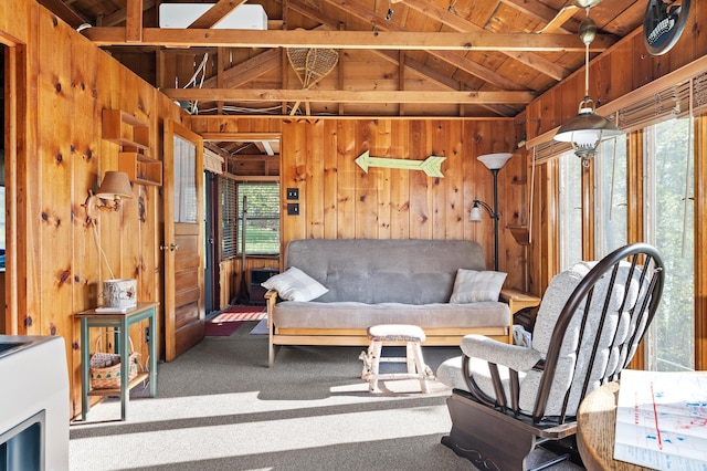 1949 Little Blake Lake Ln, Georgetown Twp, WI 54853 - living area featuring wood ceiling, plenty of natural light, wood walls, and carpet flooring