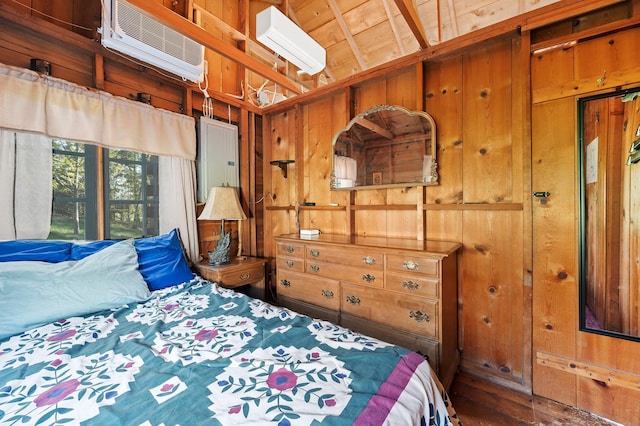 1949 Little Blake Lake Ln, Georgetown Twp, WI 54853 - bedroom featuring a wall unit AC, wood walls, and a wall mounted air conditioner