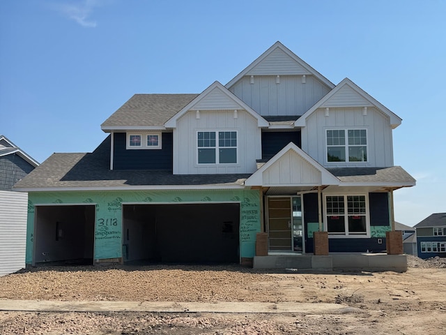 3112 Sugar Maple Dr, Chaska, MN 55318 - view of front facade with covered porch, board and batten siding, and a shingled roof
