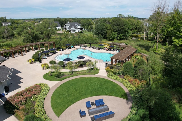 drone / aerial view of a pool area