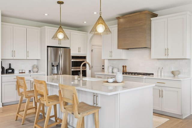 4612 Meadowview Ln, Minnetrista, MN 55331 - kitchen with stainless steel appliances, decorative backsplash, recessed lighting, and white cabinetry
