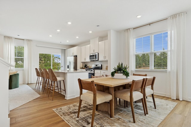 2146 Tyrone Dr, Shakopee, MN 55379 - dining area featuring light wood-style floors and recessed lighting