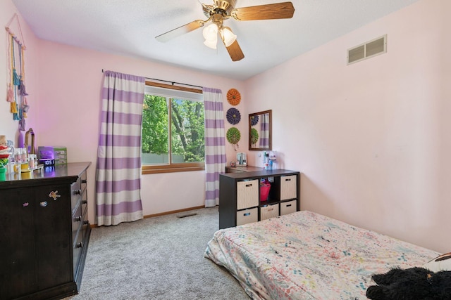 bedroom with carpet flooring, baseboards, and ceiling fan