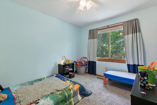 bedroom featuring carpet floors and a ceiling fan