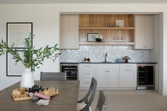 301 3rd St, Excelsior, MN 55331 - kitchen with beverage cooler, tasteful backsplash, and dark countertops