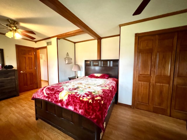 1112 10th St, Gaylord, MN 55334 - bedroom featuring wood finished floors, ornamental molding, and ceiling fan