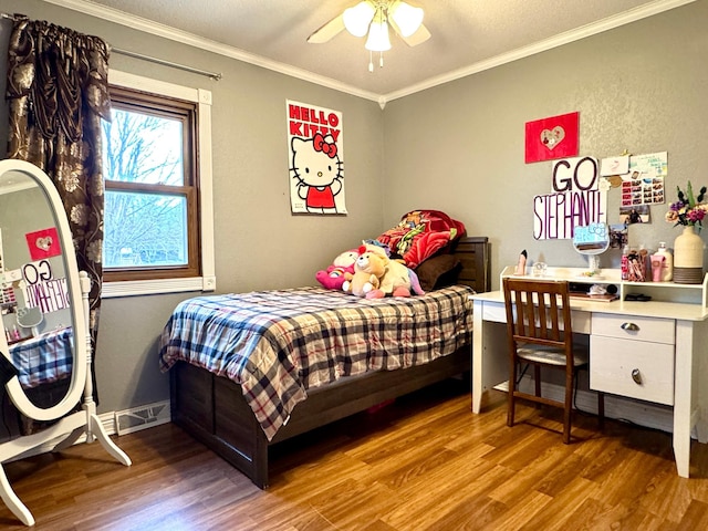 1112 10th St, Gaylord, MN 55334 - bedroom with wood finished floors, crown molding, baseboards, and an office area