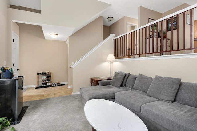 6477 Regency Ln, Eden Prairie, MN 55344 - living area featuring carpet flooring, tile patterned floors, stairs, and baseboards