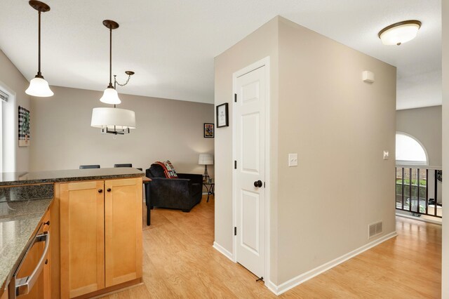 6477 Regency Ln, Eden Prairie, MN 55344 - corridor featuring light wood-type flooring and baseboards
