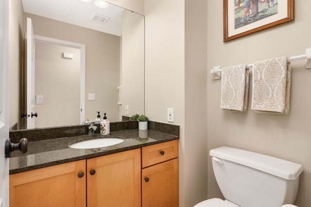 6477 Regency Ln, Eden Prairie, MN 55344 - bathroom with vanity and toilet