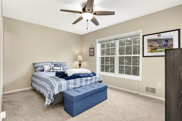 6477 Regency Ln, Eden Prairie, MN 55344 - carpeted bedroom featuring baseboards and a ceiling fan
