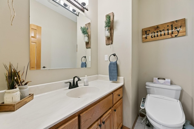 half bathroom with toilet, vanity, and tile patterned flooring