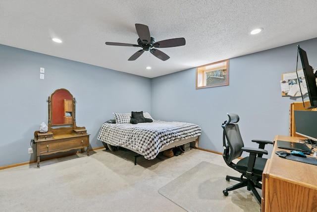 carpeted bedroom with ceiling fan, baseboards, and recessed lighting