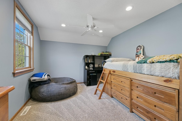 bedroom with light colored carpet, vaulted ceiling, baseboards, a ceiling fan, and recessed lighting