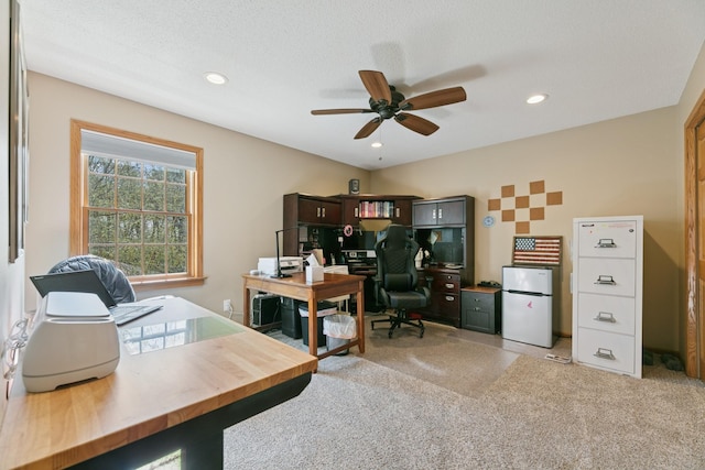 office area with light colored carpet, a ceiling fan, and recessed lighting