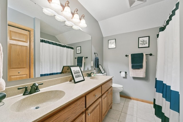full bath featuring lofted ceiling, baseboards, double vanity, toilet, and tile patterned floors