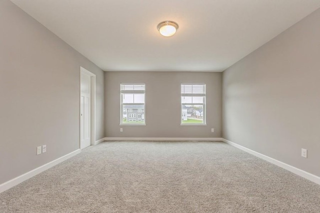 20023 62nd Pl, Corcoran, MN 55340 - empty room with carpet and baseboards