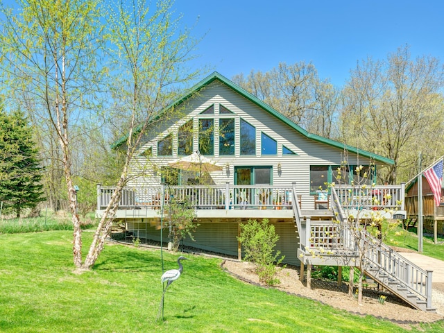 1351 Lone Pine Ln, Garfield Twp, WI 54001 - rear view of house featuring stairs, a deck, and a lawn