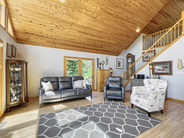 1351 Lone Pine Ln, Garfield Twp, WI 54001 - living area with stairway, wood finished floors, wood ceiling, high vaulted ceiling, and baseboards