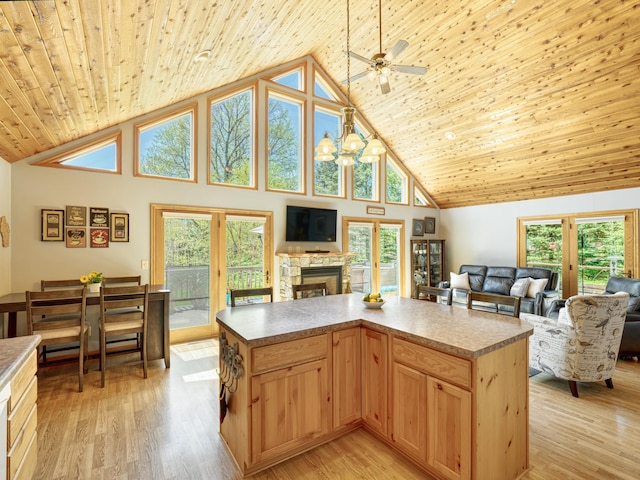 1351 Lone Pine Ln, Garfield Twp, WI 54001 - kitchen with open floor plan, high vaulted ceiling, a fireplace, light brown cabinetry, and wooden ceiling