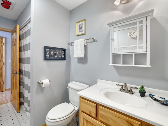 1351 Lone Pine Ln, Garfield Twp, WI 54001 - bathroom with toilet, vanity, tile patterned flooring, and curtained shower