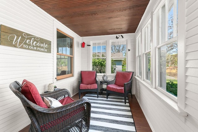 681 4th St NE, Little Falls, MN 56345 - sunroom featuring wood ceiling, wood finished floors, and wooden walls