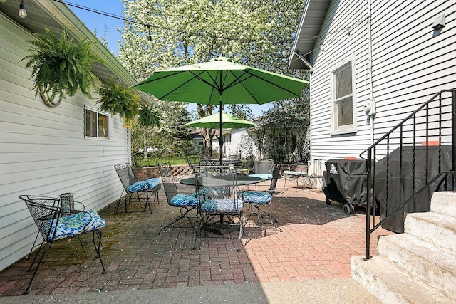 681 4th St NE, Little Falls, MN 56345 - view of patio / terrace with outdoor dining area