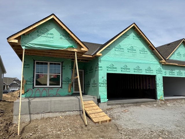 20056 66th Pl, Corcoran, MN 55340 - property in mid-construction with a shingled roof, an attached garage, and covered porch