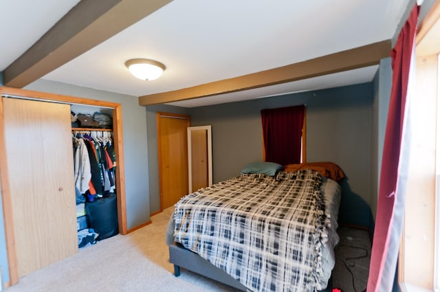 bedroom with carpet floors and a closet