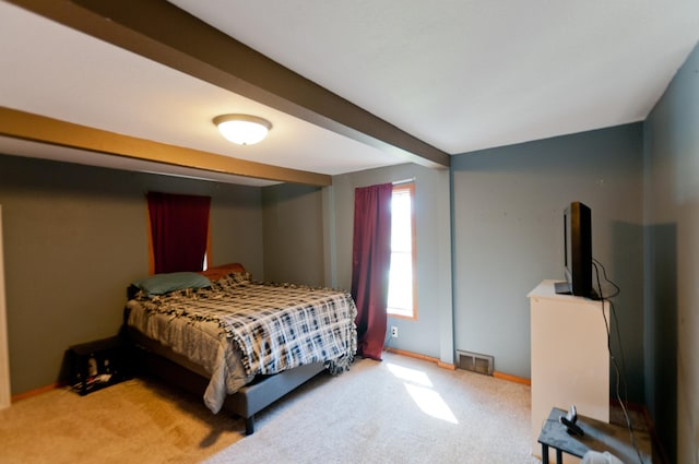 bedroom featuring carpet floors and baseboards