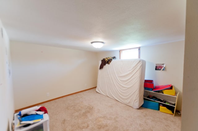 rec room featuring carpet floors