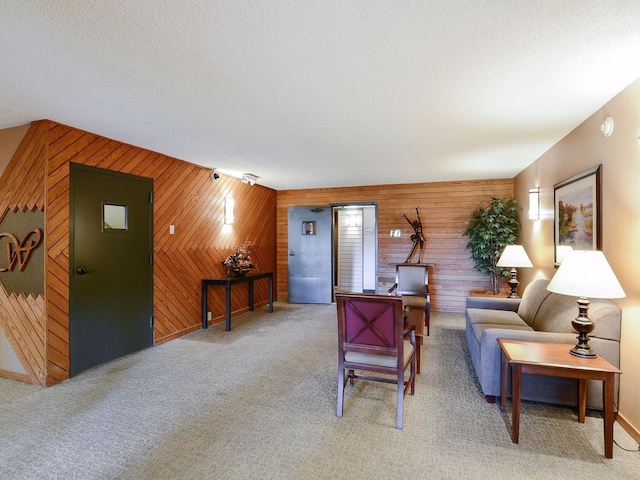 7520 Cahill Rd Unit 222A, Edina, MN 55439 - carpeted living room with wood walls and a textured ceiling