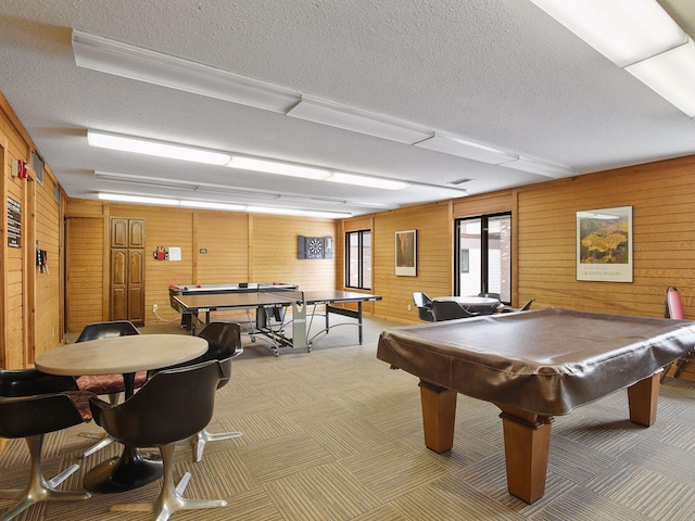 7520 Cahill Rd Unit 222A, Edina, MN 55439 - recreation room with a textured ceiling, billiards, carpet floors, and wooden walls